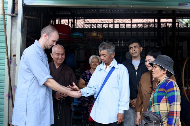 Praying for rebirth and releasing creatures in Ba Lua port, Cu Chi